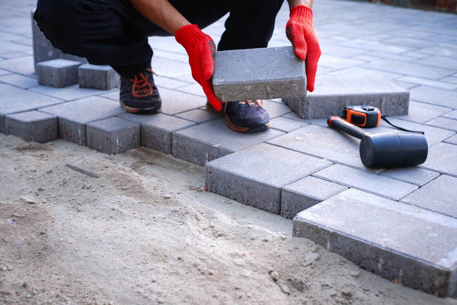 Professional brick paver installation process with expert craftsmanship in Jupiter, Florida